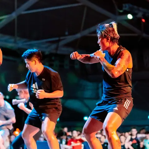 Participants training together at a BODYCOMBAT event